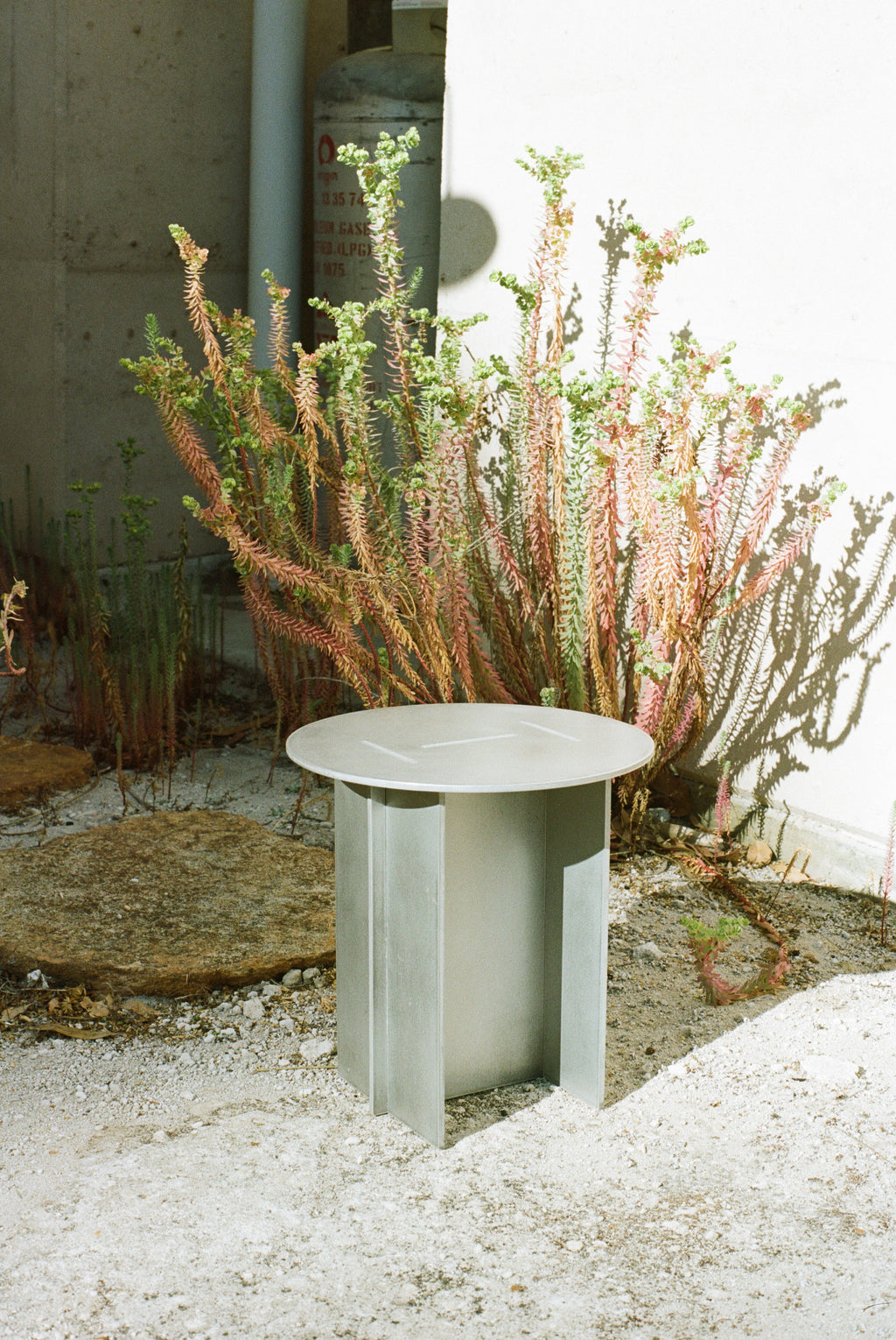 ROUND SIDE TABLE by DISORDINARY